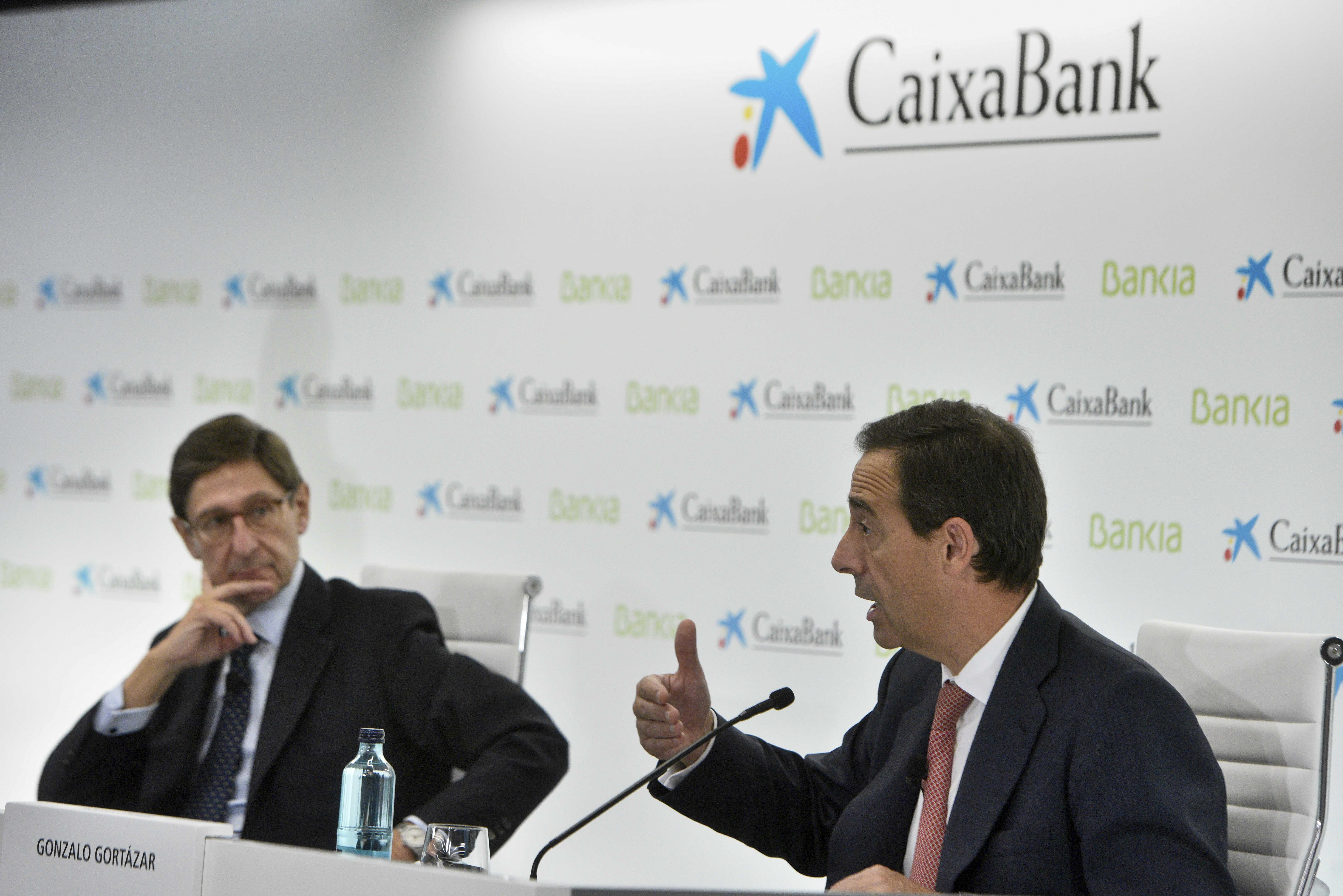 Jos Ignacio Goirigolzarri (Bankia) y Gonzalo Gortzar (CaixaBank).