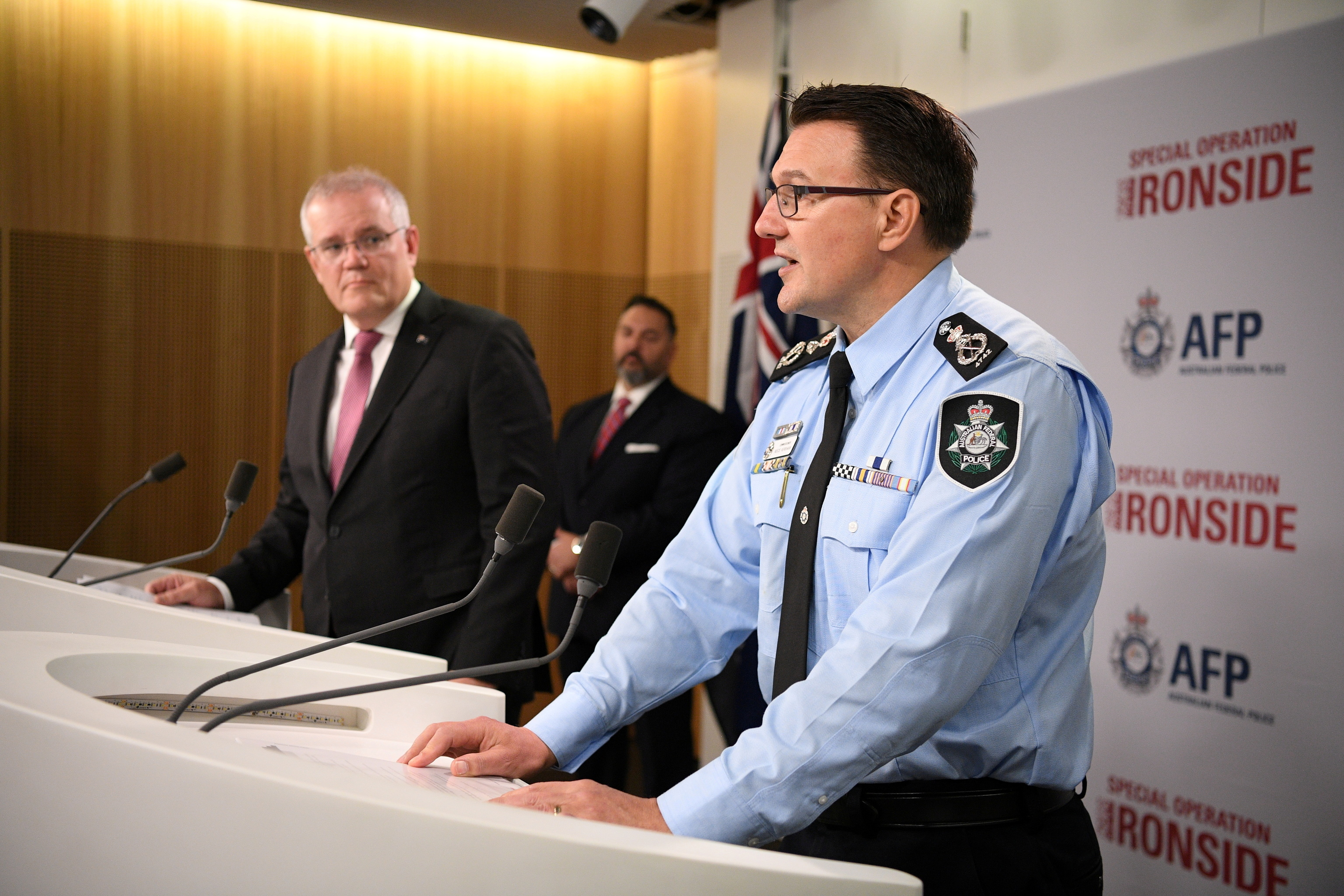 El comisionado de la Polica de Australia, Reece Kershaw, y primer ministro de este pas, Scott Morrison.