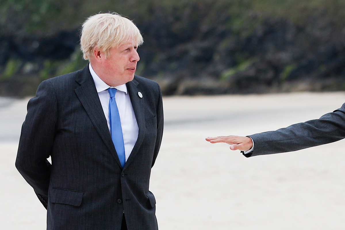 Boris Johnson, junto a Emmanuel Macron, el Carbys Bay.