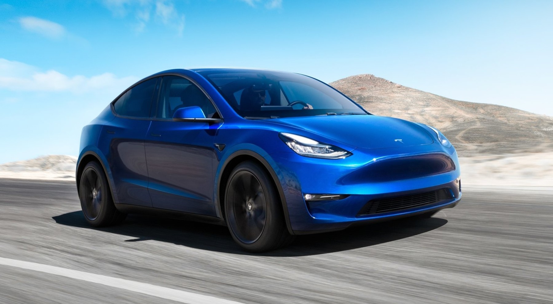 Tesla Model Y, coche eléctrico, baterías, cop26
