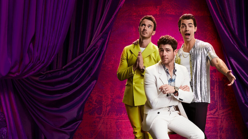 Imagen promocional de Jonas Brothers Family Roast, nuevo gnero de comedia de Betfliz con familias famosas.