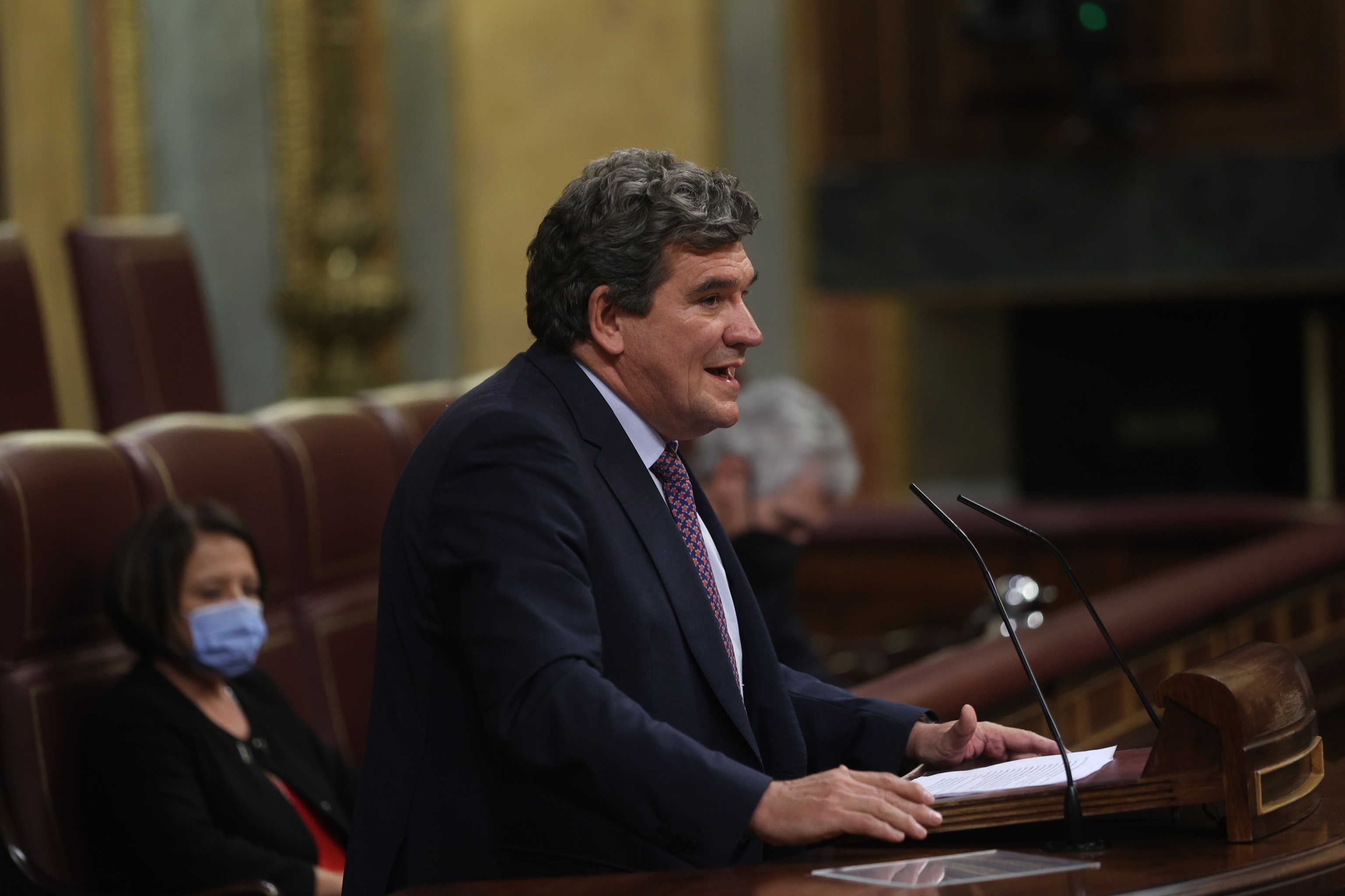 El ministro de Seguridad Social, José Luis Escrivá, exponiendo su discurso desde la tribuna del Congreso.