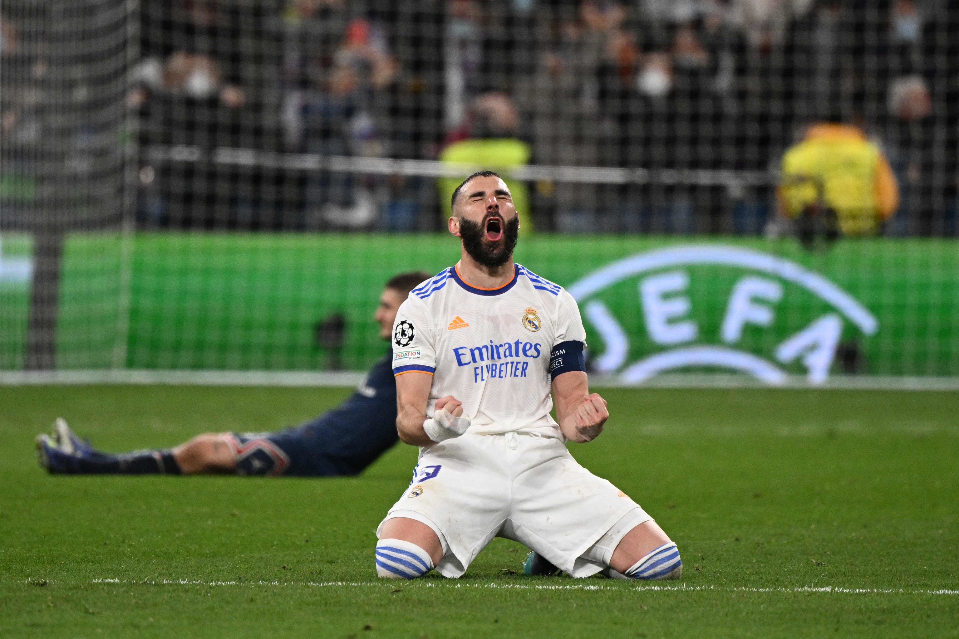 Benzema celebrates one of his goals against PSG.