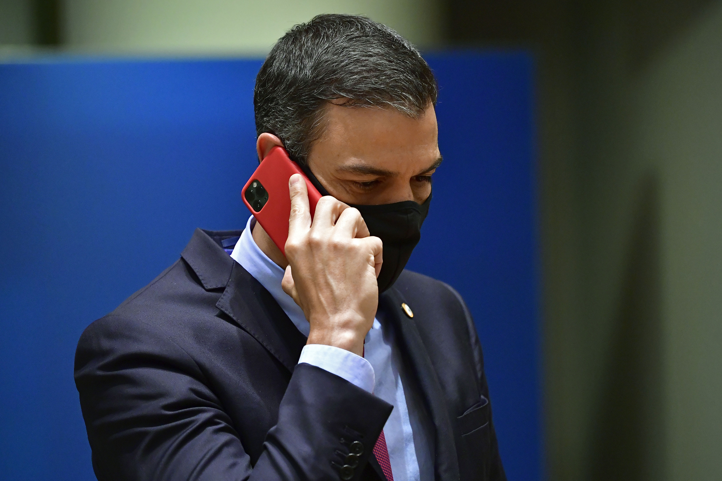 FILE - Spain's Prime Minister  lt;HIT gt;Pedro lt;/HIT gt;  lt;HIT gt;Sanchez lt;/HIT gt; speaks on his cell phone during a round table meeting at an EU summit in Brussels, Monday, July 20, 2020. Spanish officials said on Monday May 2, 2022 that the cellphones of the prime minister and the defense minister were infected with Pegasus spyware that is only available to government agencies, in an operation that was not authorised by the government. Reports detailing the breaches have been transferred to Spain's National Court for further investigation. (John Thys, Pool Photo via AP, File)