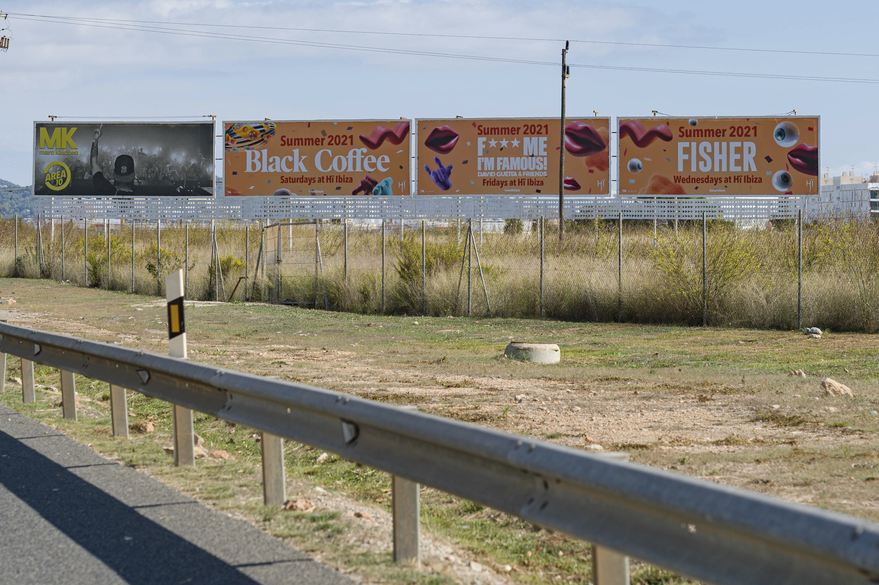 Billboards on the airport highway, Ibiza.