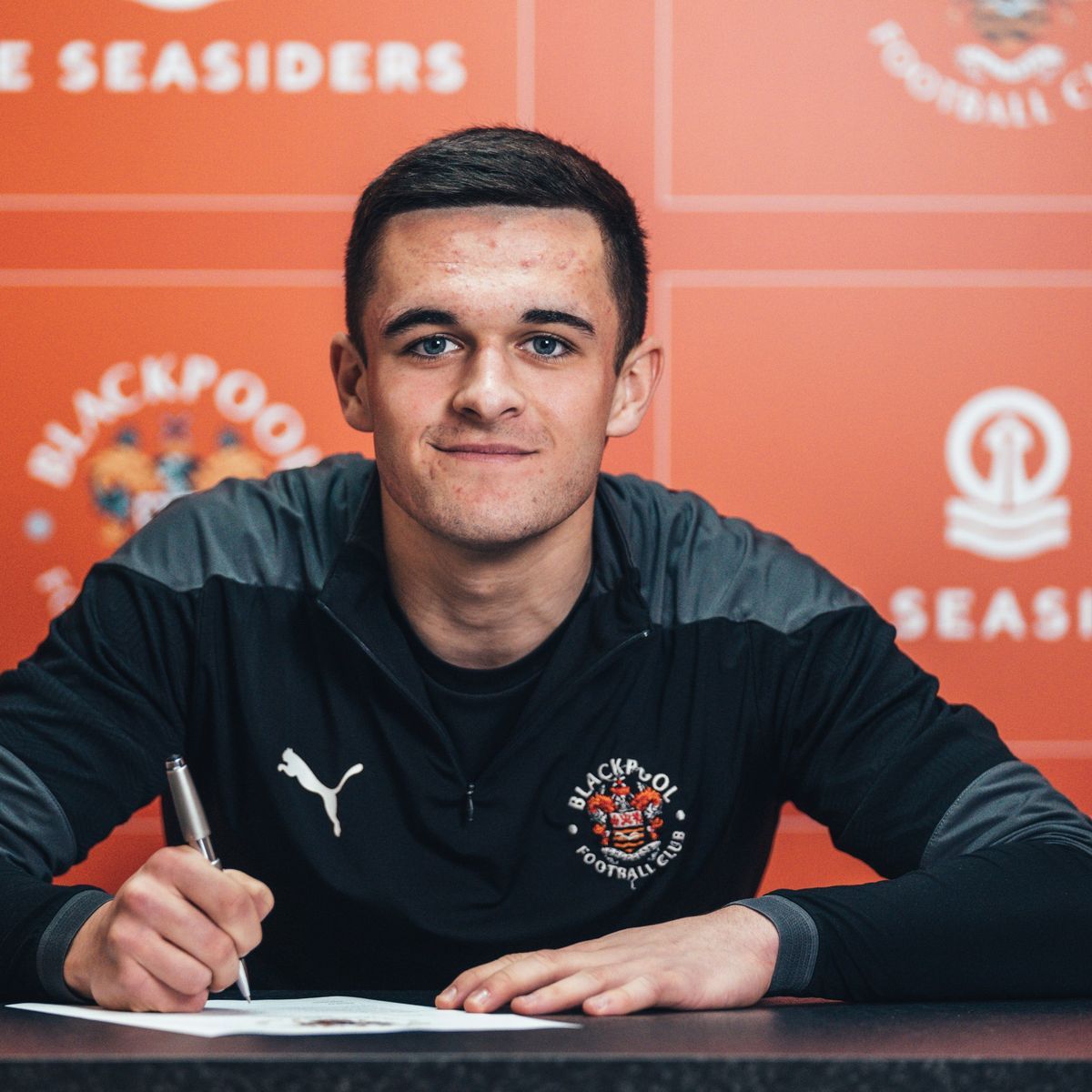 Jack Daniels signed his first professional contract with Blackpool.