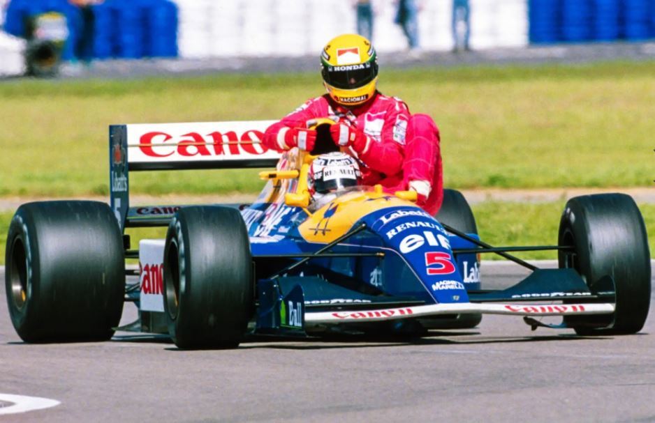 1991 British GP .  Nigel Mansell leads Ayrton Senna in his Williams
