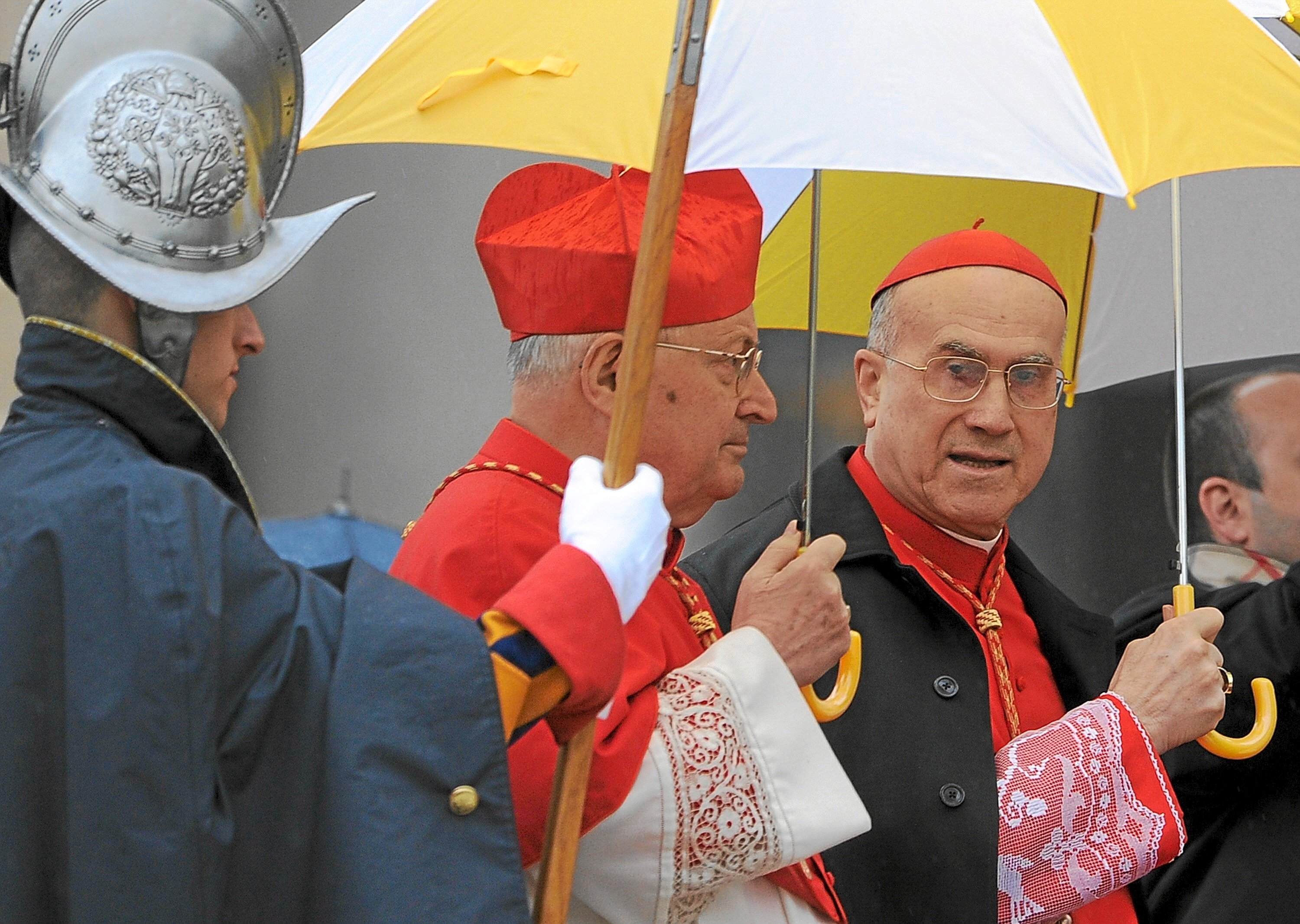 Angelo Sodano (left) and Tarcisio Bertone (right) in St. Peter's Square during Holy Week in 2010.
