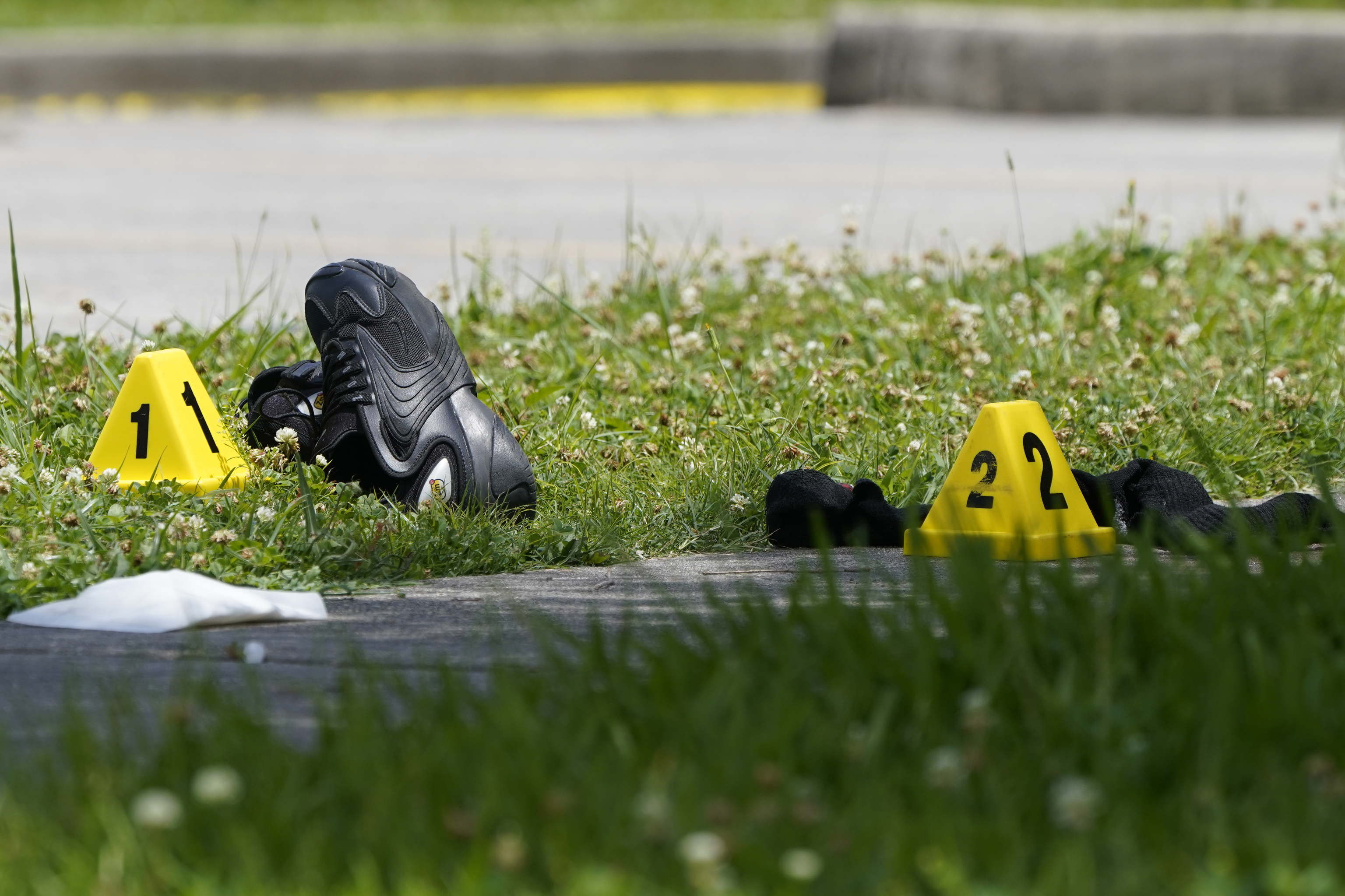 Shoes and clothing with proof marks at the shooting site.