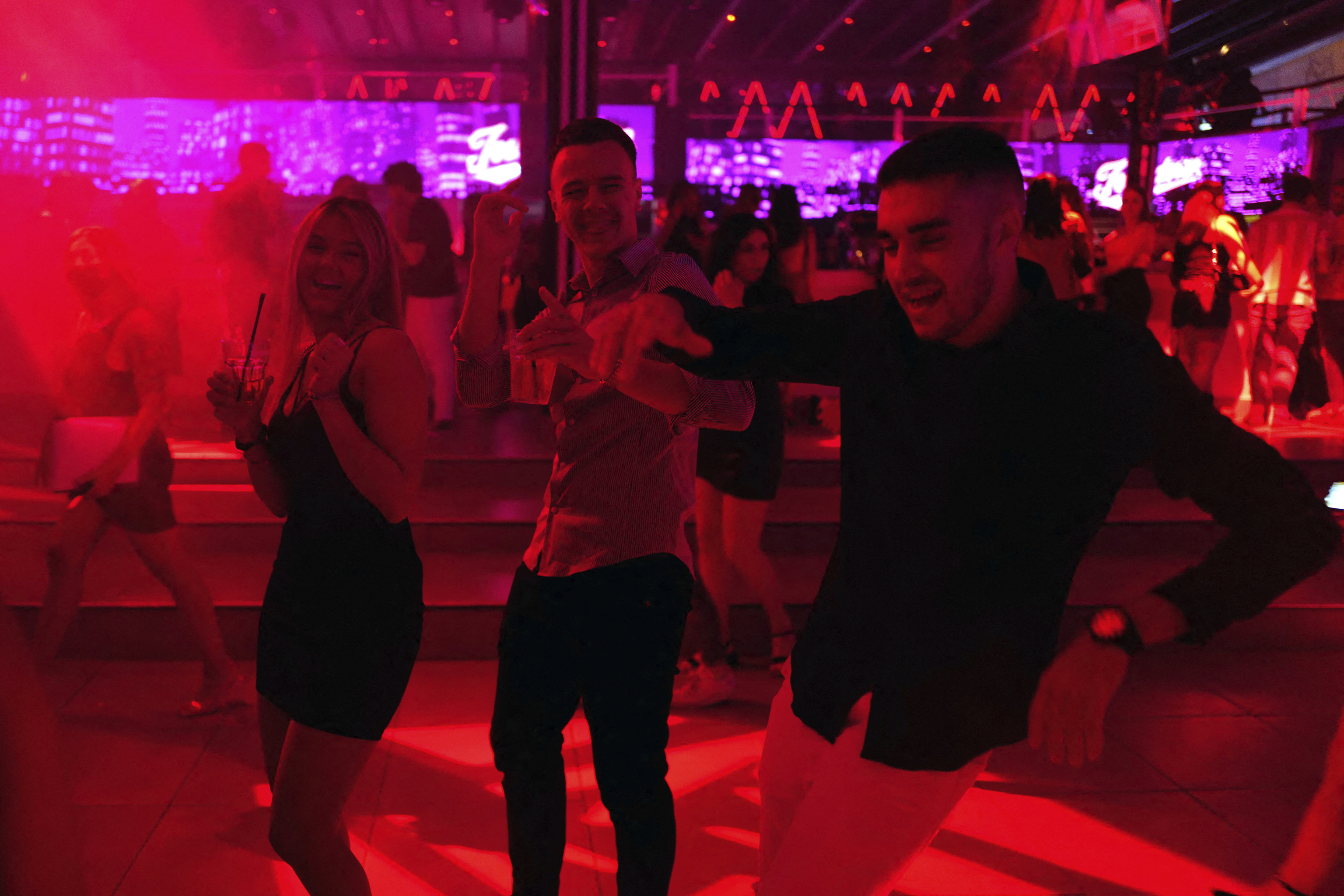 People dancing in a nightclub in France.