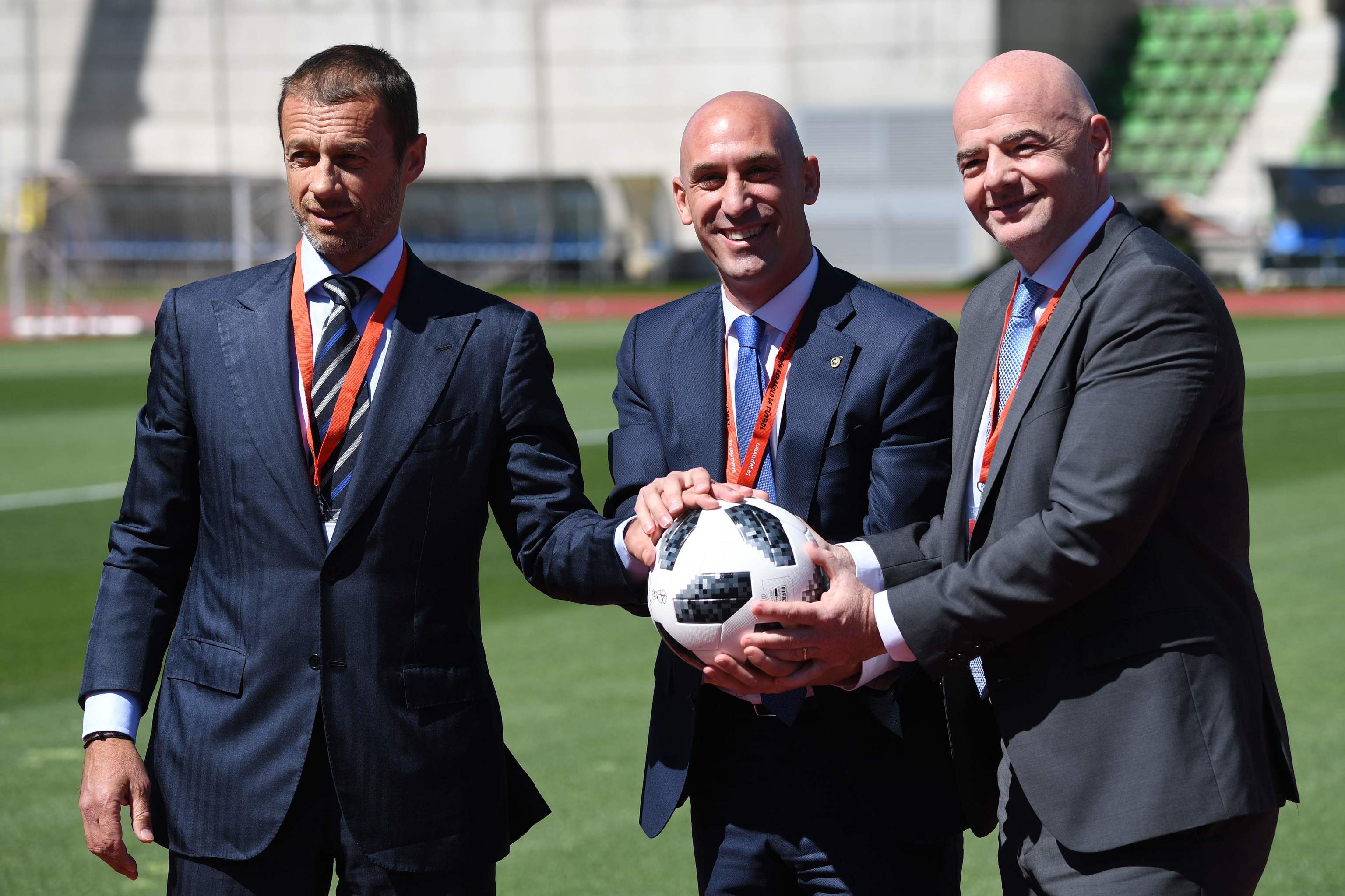 Ceferin (UEFA), Rubiales (RFEF) and Infantino (FIFA).