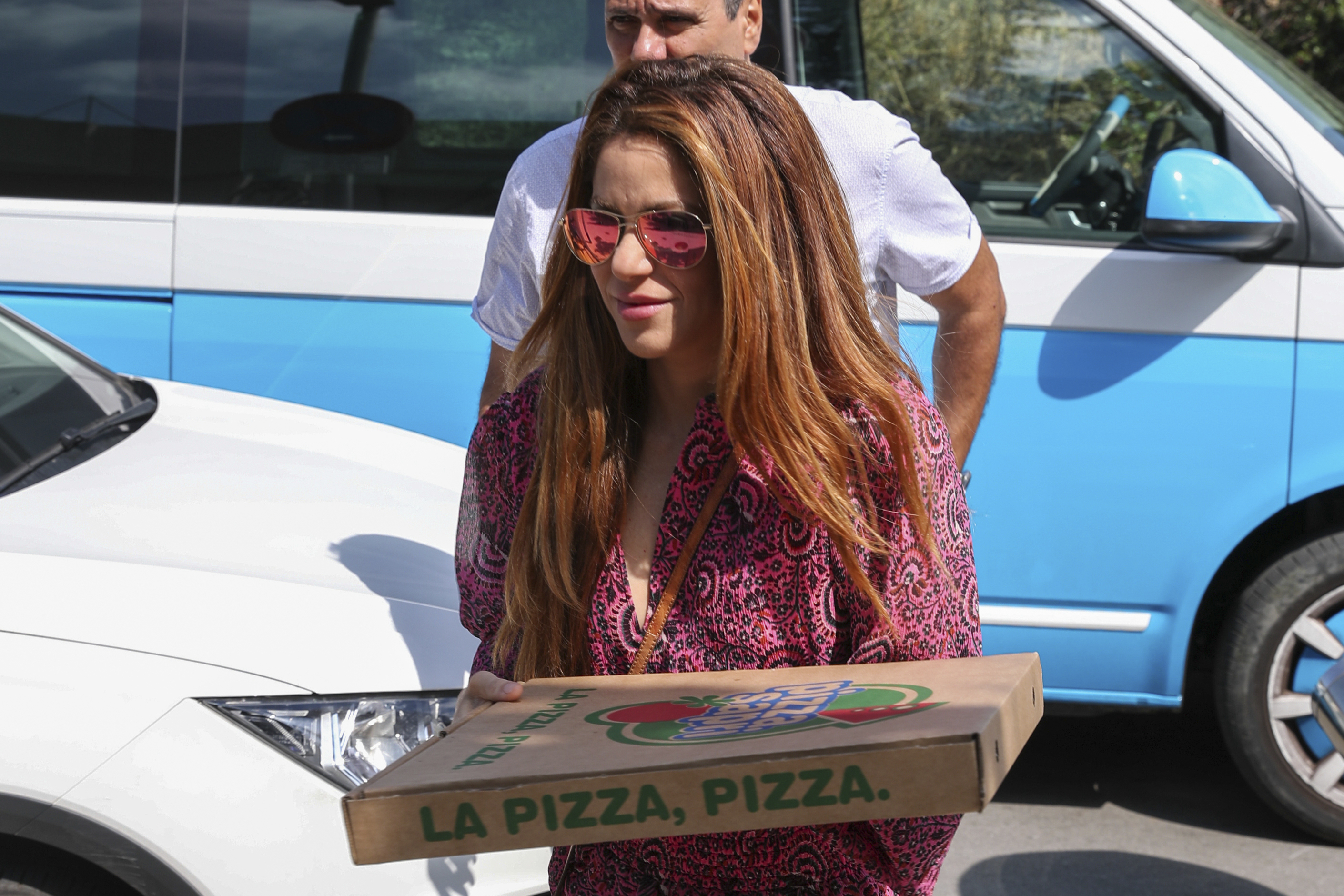 Shakira con una pizza