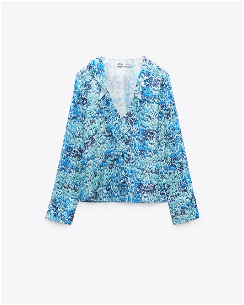 ALT: Blusa con mangas con abertura de Zara