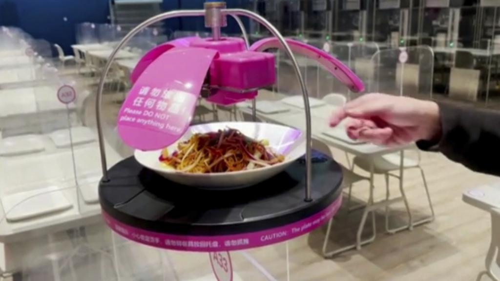 Un robot sirve comida en la pasada edición de los Juegos Olímpicos de Pekín.