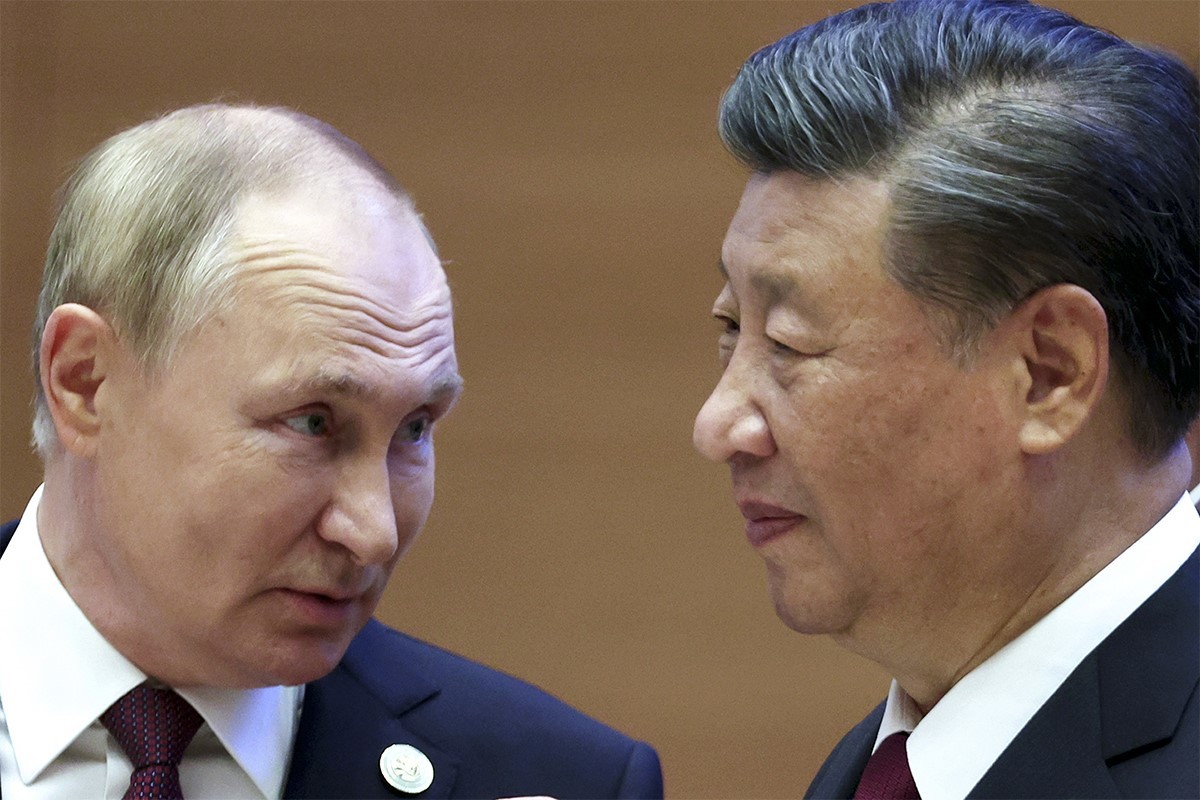 Vladimir Putin con el presidente chino Xi Jiping.