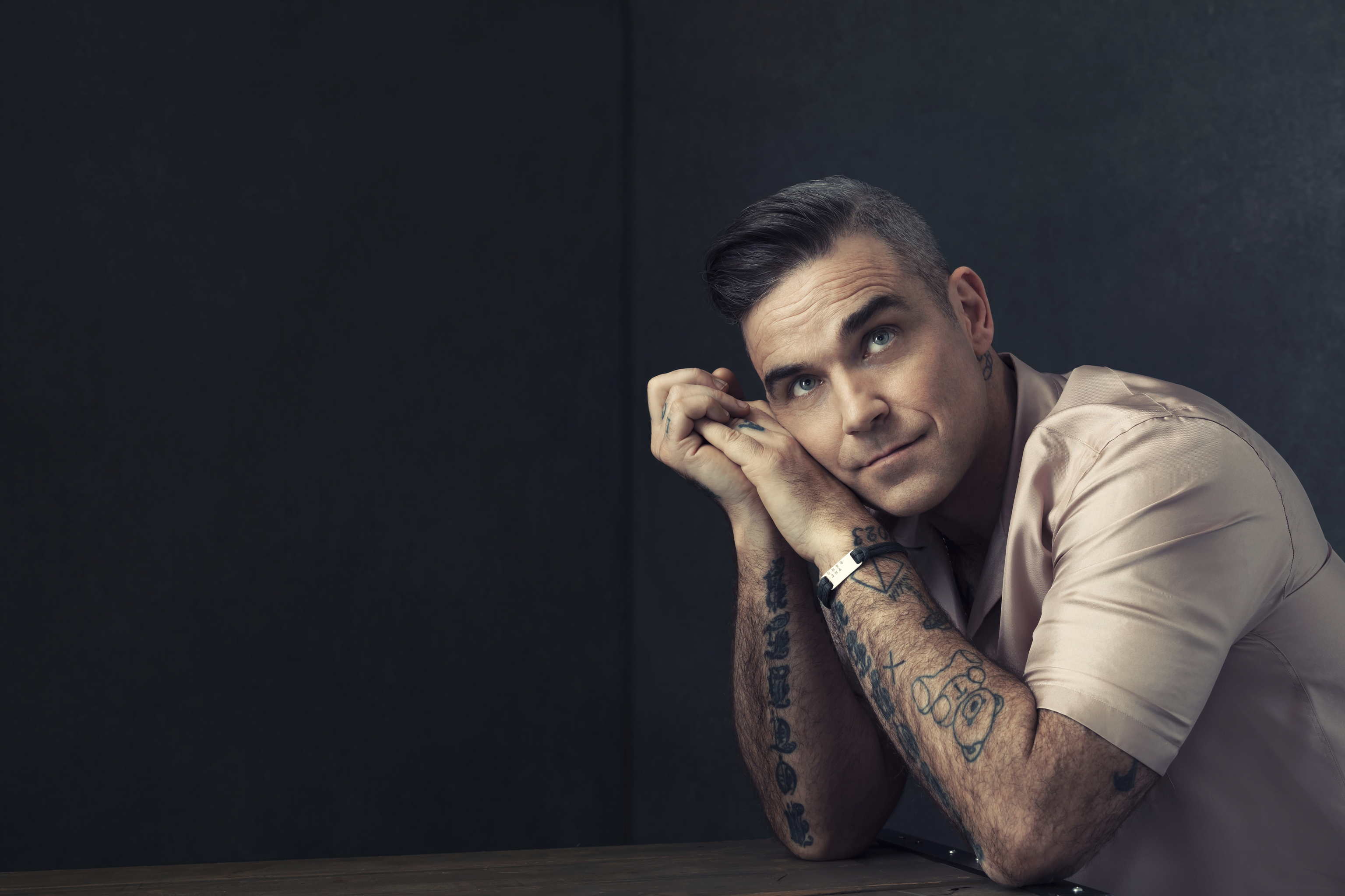 Робби уильямс песни слушать. Робби Уильямс. Robbie Williams певец. Робби Уильямс 2022. Робби Уильямс певец 2020.