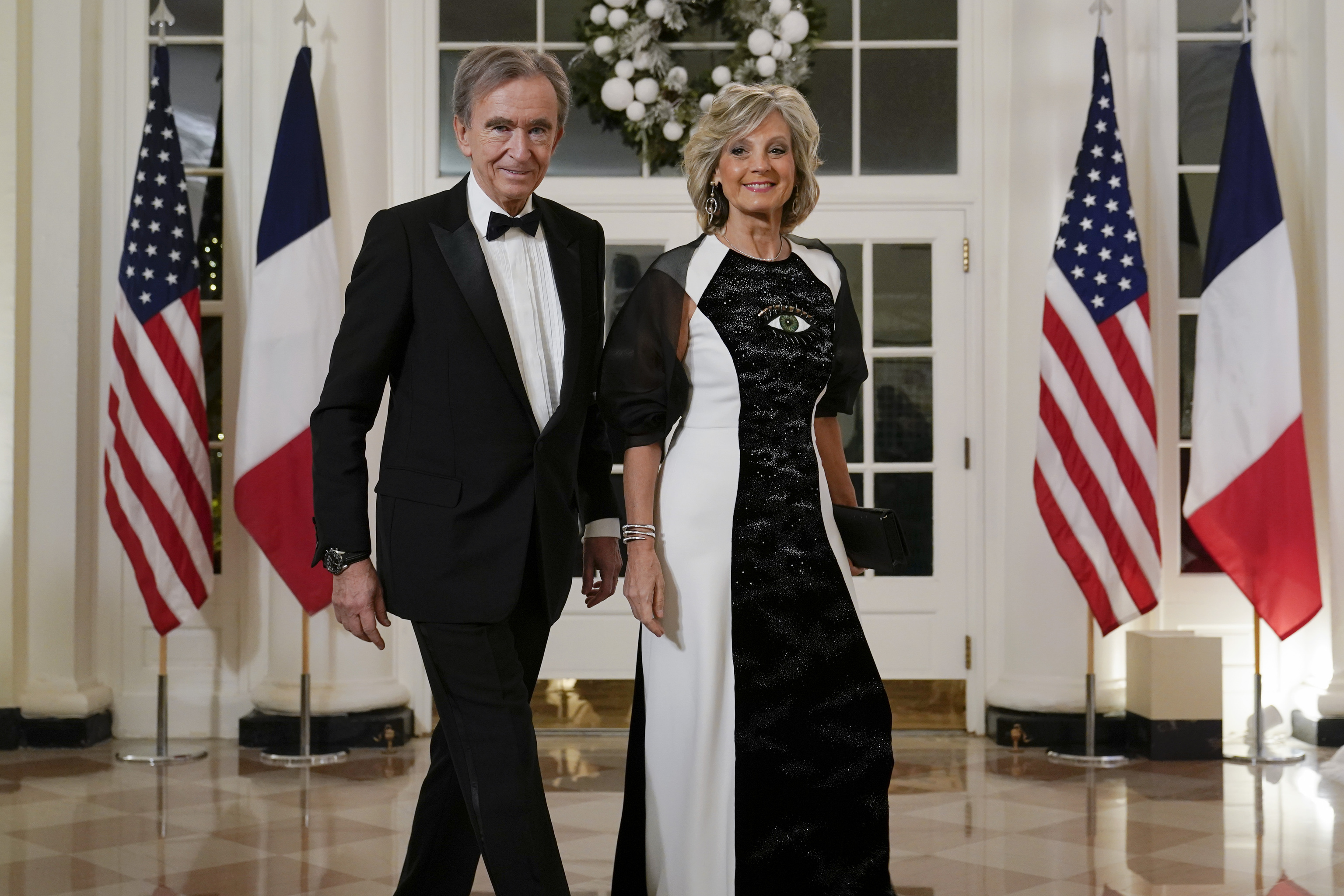 Barnard Arnault y su mujer, el pasado 1 de diciembre, en una cena en la Casa Blanca.