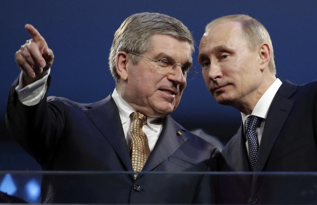 El presidente del COI, Thomas Bach, y el presidente de Rusia, Vladimir Putin, en la inauguración de Sochi 2014.