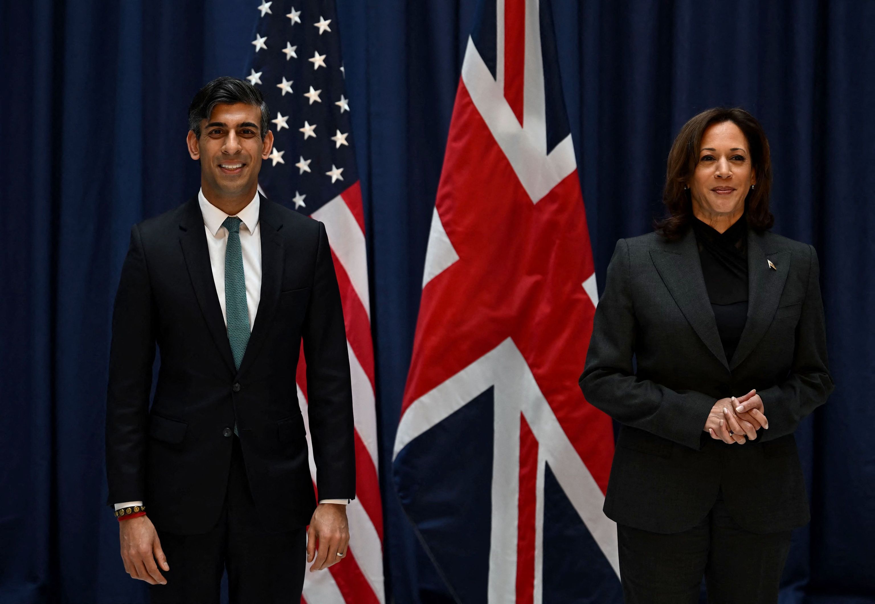 Britain's Prime Minister Rishi Sunak (L) and US Vice President  lt;HIT gt;Kamala lt;/HIT gt; Harris pose as they meet at the Munich Security Conference (MSC) in Munich, southern Germany, on February 18, 2023. - The Munich Security Conference running from February 17 to 19, 2023 brings world leaders together ahead of the first anniversary of Russia's invasion of Ukraine as Kyiv steps up pleas for more weapons. (Photo by Ben Stansall / POOL / AFP)