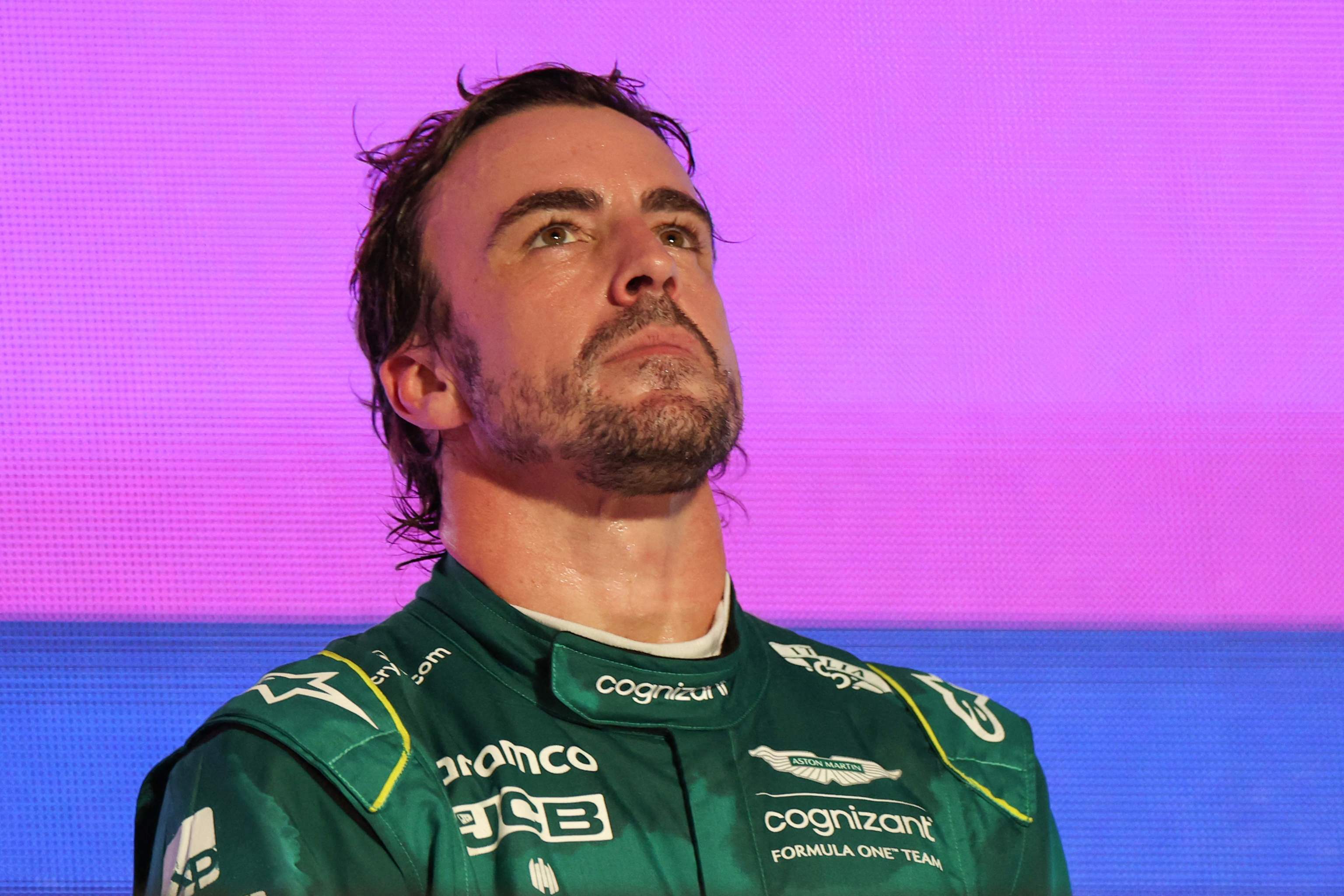 Aston Martin's Spanish driver Fernando  lt;HIT gt;Alonso lt;/HIT gt; reacts on the podium at the end of the Saudi Arabia Formula One Grand Prix at the Jeddah Corniche Circuit in Jeddah on March 19, 2023. (Photo by Giuseppe CACACE / AFP)