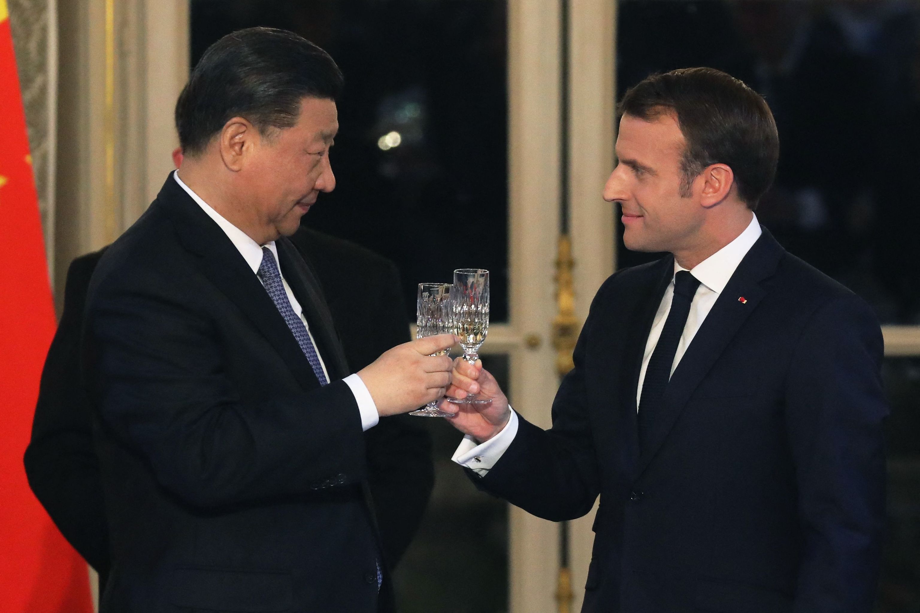 Macron (d) y el presidente chino Xi en marzo de 2019.