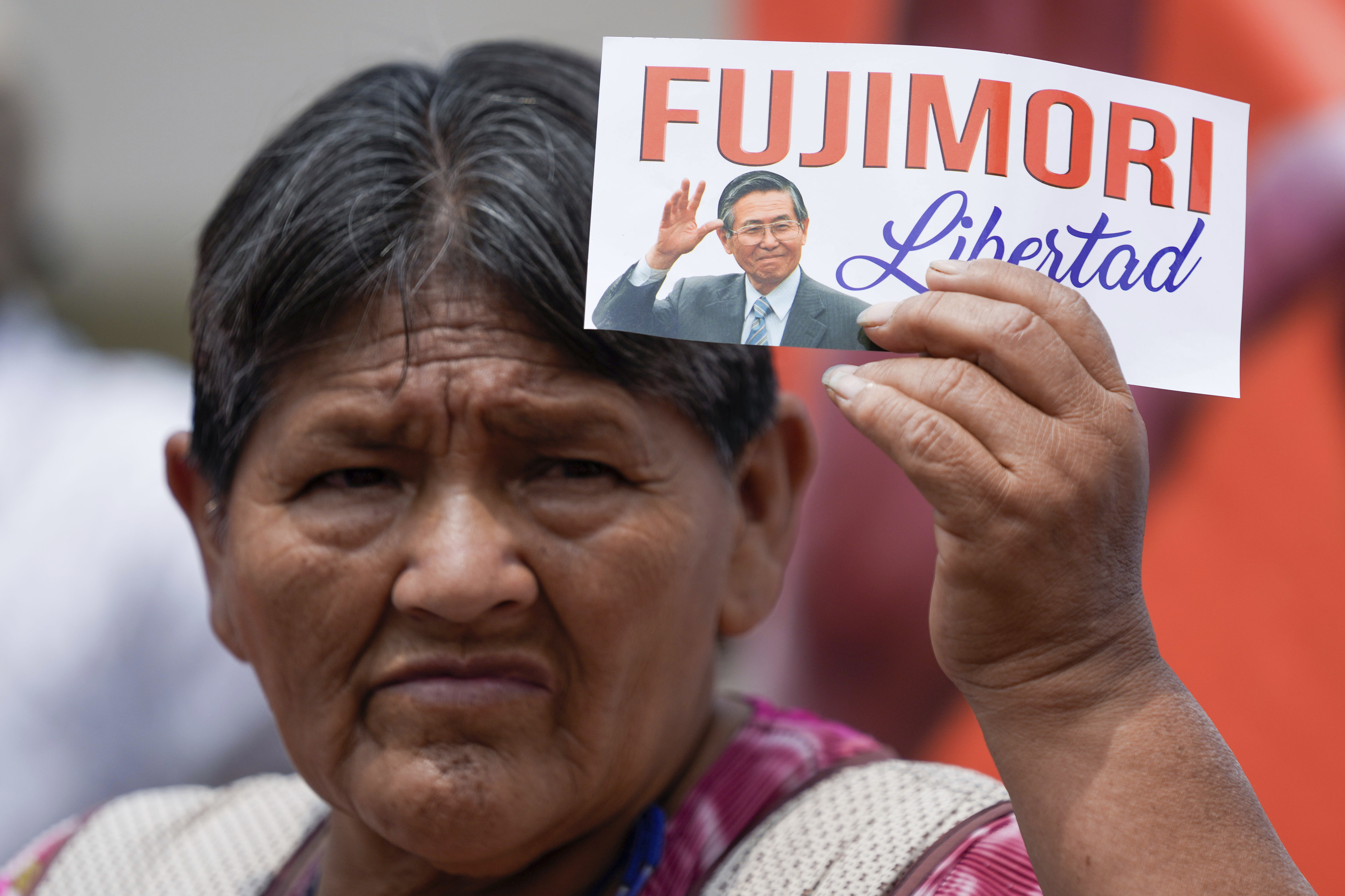 A Fujimori follower at the prison gates.