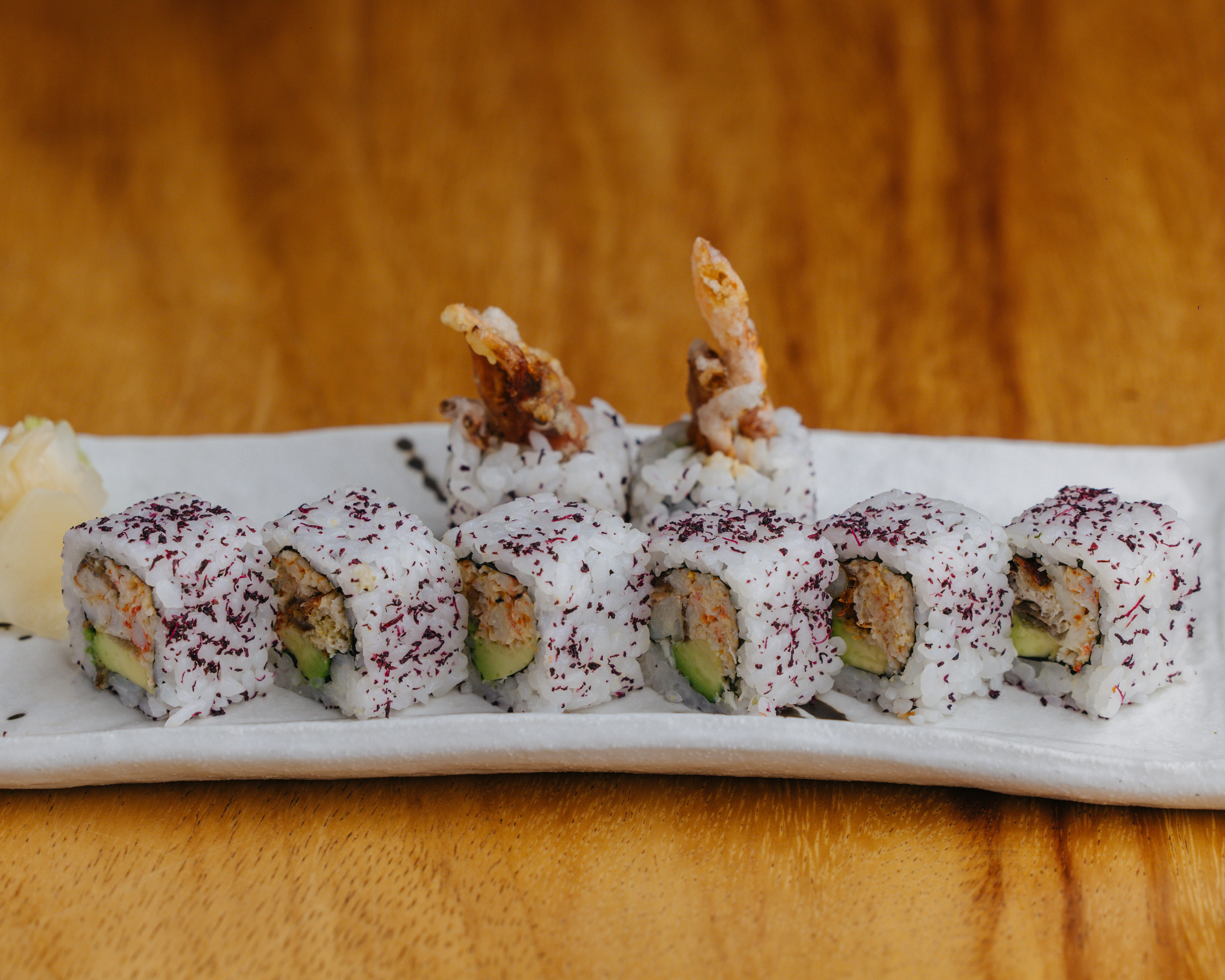 Plato de sushi de 99 Sushi Bar.