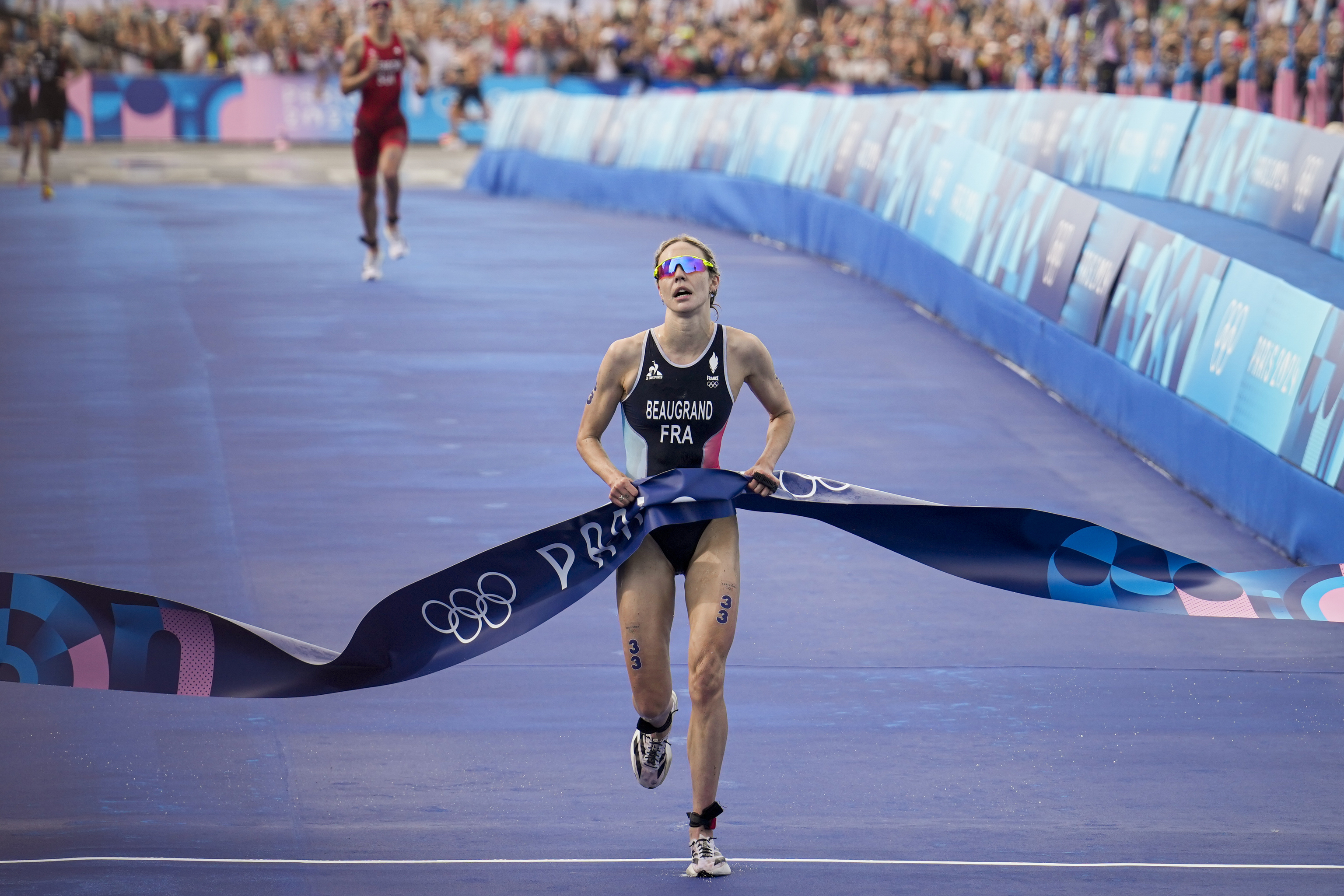 Cassandre Beaugrand crosses the finish line on the Pont Alexandre III in Par