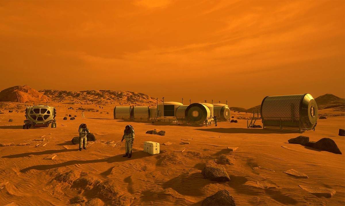 Astronautas trabajando en una base marciana.