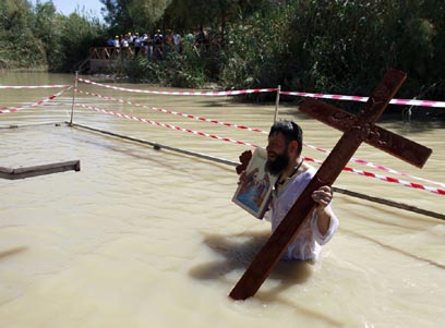 bautizos en el r¿o Jordan (Reuters)