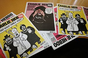 Portadas de algunas ediciones especiales de 'Charlie Hebdo'. (Foto: AFP)