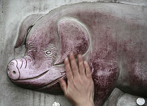 Relieve del cerdo, en un templo. (Foto: REUTERS)
