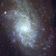 Imagen de 1998, captada por el telescopio Isaac Newton, de la galaxia M33. (Foto: IAC | RGO | D. Malin)