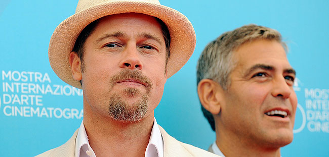 Pitt y Clooney, en la Mostra. (Foto: AFP)