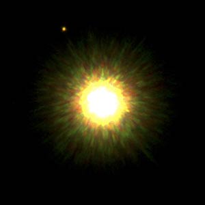 El exoplaneta (extremo superior izquierdo) orbitando la estrella. (Foto: REUTERS)