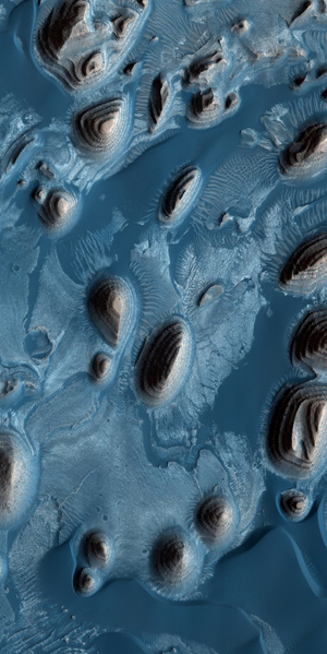 Una de las imgenes de los crteres de Marte captadas por la 'Mars Reconaissance Orbiter'. (Foto: Science)