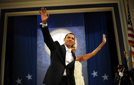Obama y su mujer, en una de las fiestas de anoche. | AFP