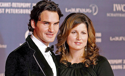 Federer, junto a su esposa. | Efe
