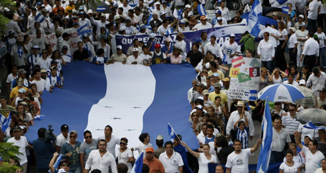 Manifestacin en Honduras tras la vuelta de Zelaya al pas. | AP
