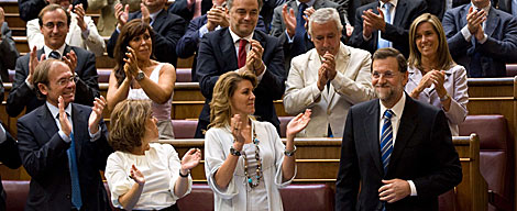 Rajoy, ovacionado por la bancada 'popular' tras su discurso. | AFP
