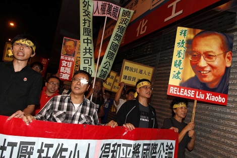 Manifestacin en Hong Kong por el disidente chino encarcelado. | Ap