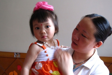 Una nia, en un orfanato chino. | Foto: ACI