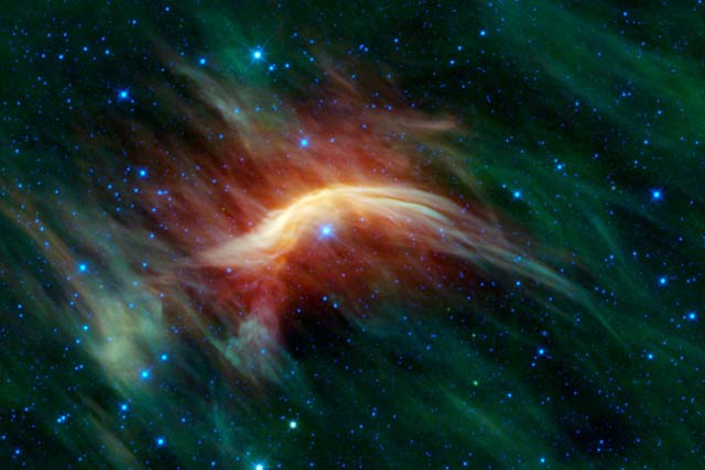 La estrella fugitiva Zeta Ophiuchi (en el centro de la imagen). | NASA/WISE, Caltech/UCLA