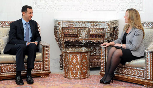El presidente Asad y la ministra Trinidad Jimnez, en Damasco. | Afp