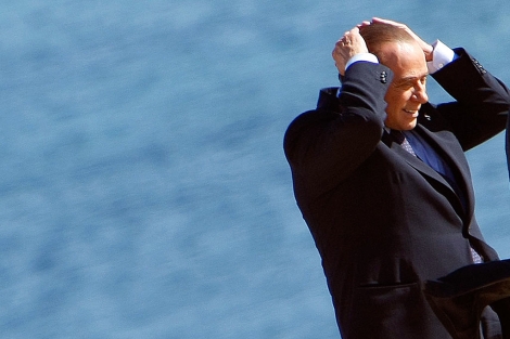Berlusconi, durante la visita. | Reuters