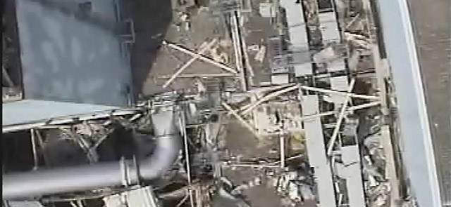 Imagen area que muestra los daos del reactor 1 de Fukushima.| AP