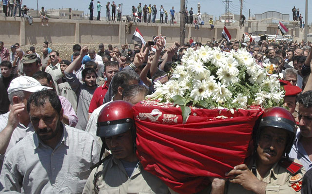 Funeral por un polica muerto en una emboscada en Siria. | Efe
