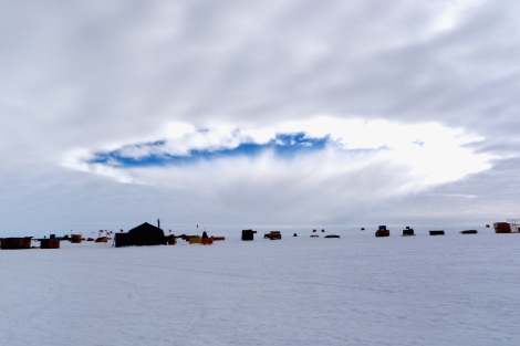 Agujero en una nube provocado por un avión en la Antártida. | Science