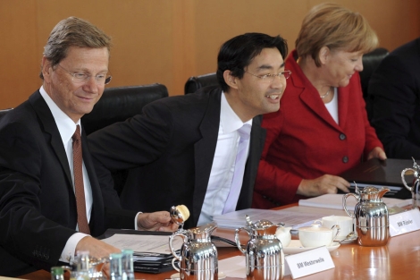 Merkel junto a los ministros alemanes de Economa y Exteriores. | Efe