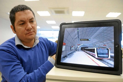Un programador de la firma Virtualware muestra la aplicacin contra las fobias del metro. | P. C.